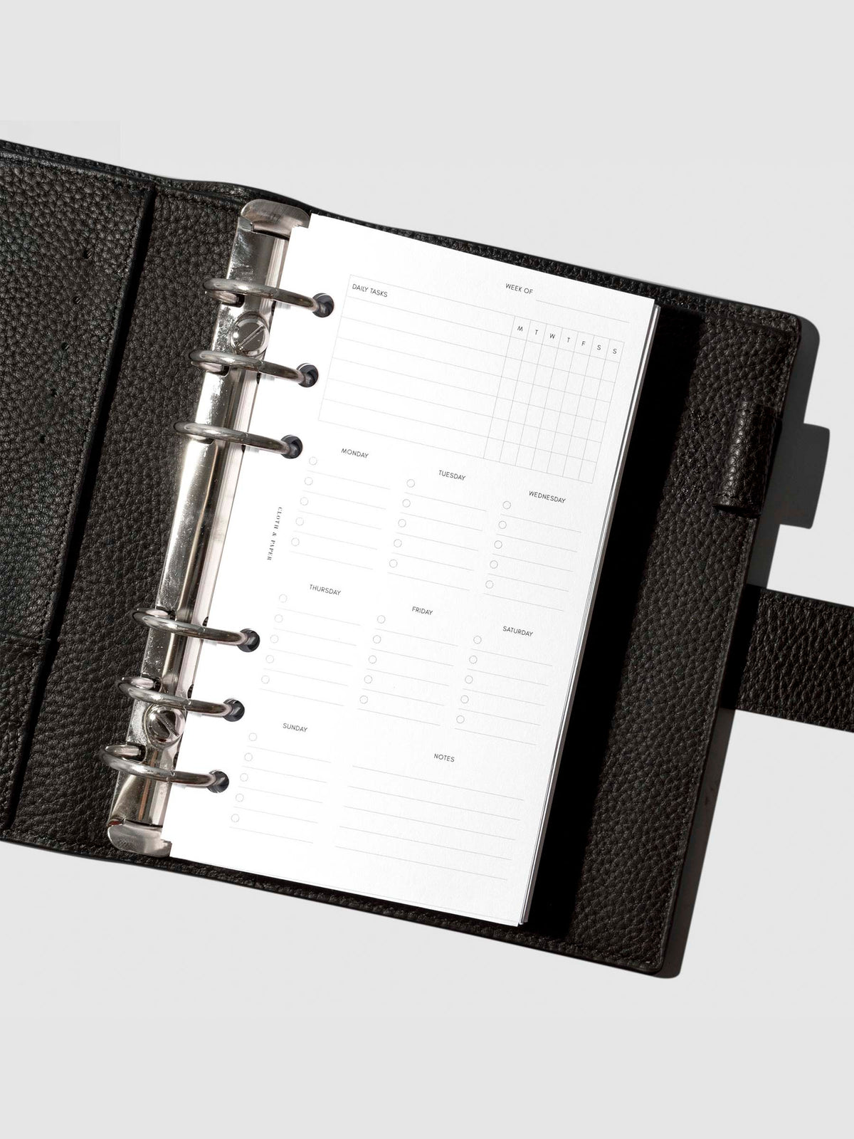 Insert in use inside a black leather planner.