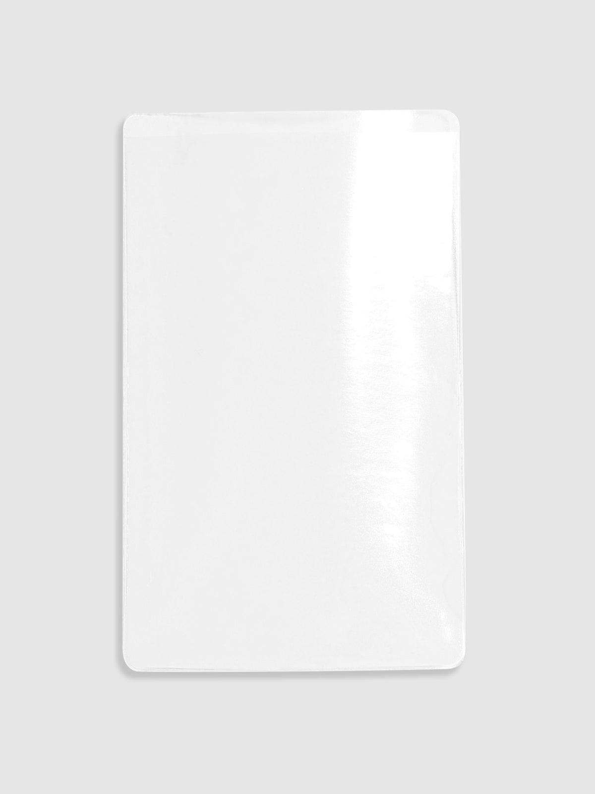 Clear Adhesive Pocket, Cloth and Paper. Pocket displayed on a neutral background.