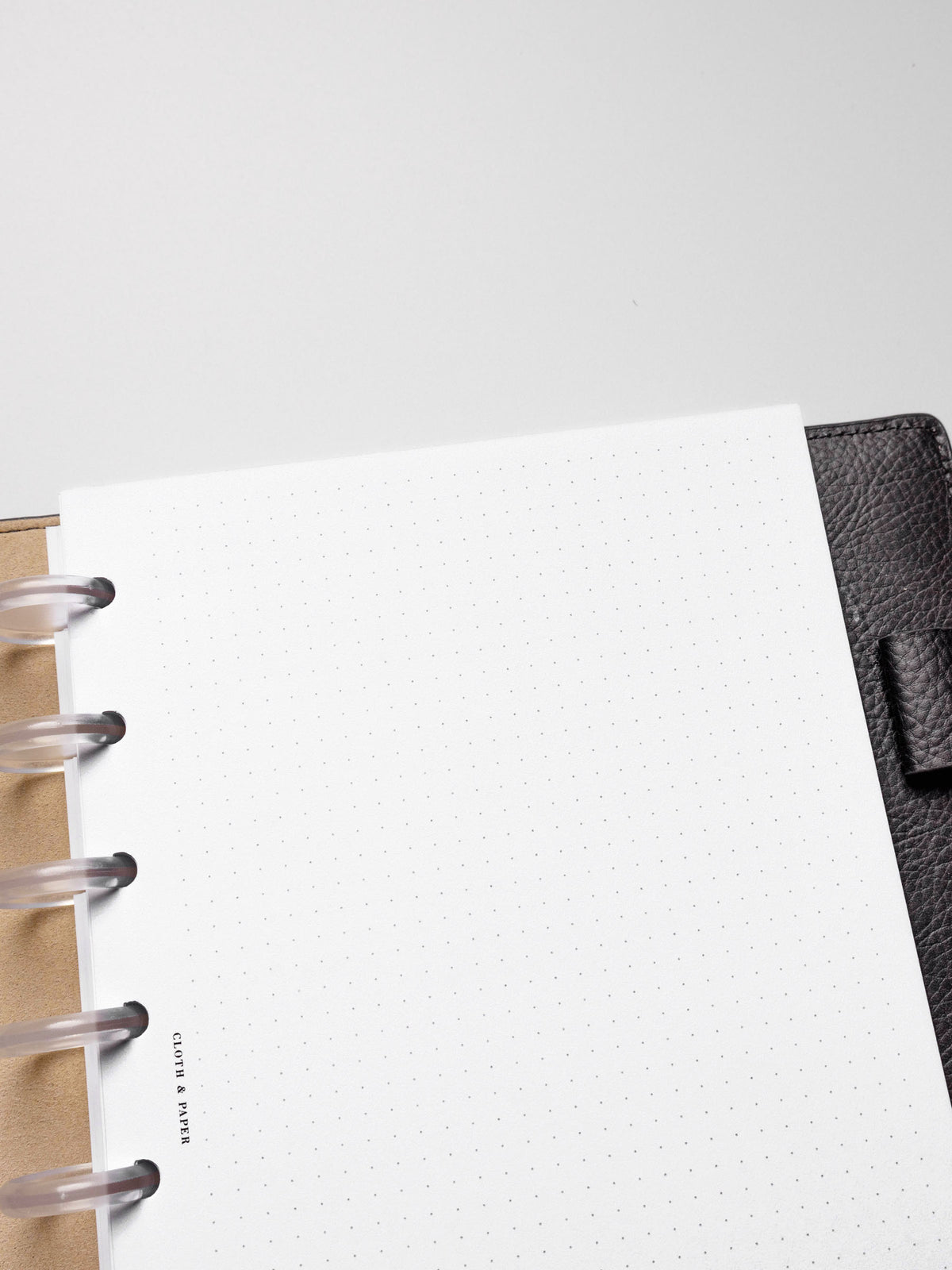 Insert in use inside a black leather planner.