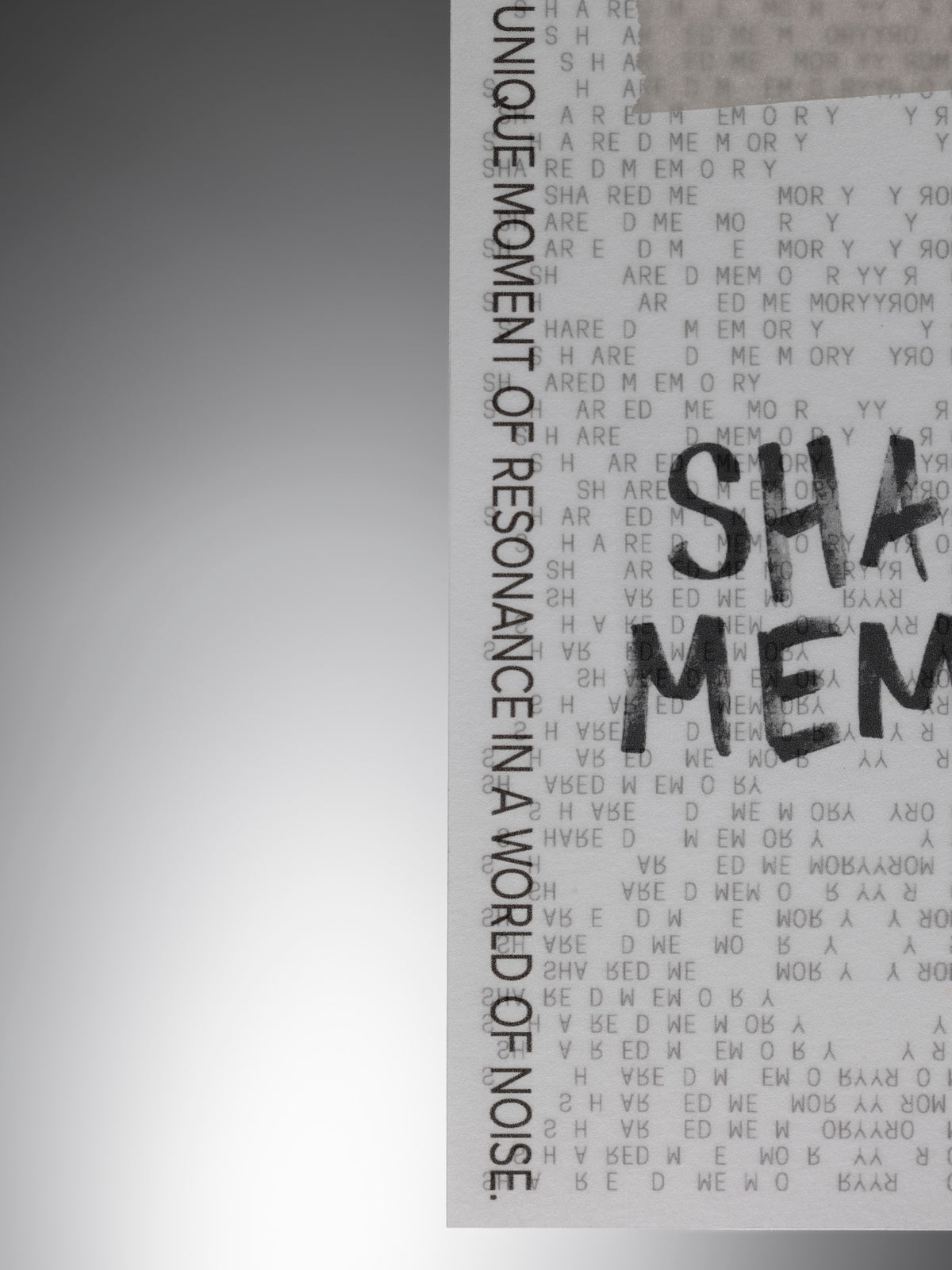 Close up view of a translucent vellum journaling card with a black printed text design reading "Shared Memory".