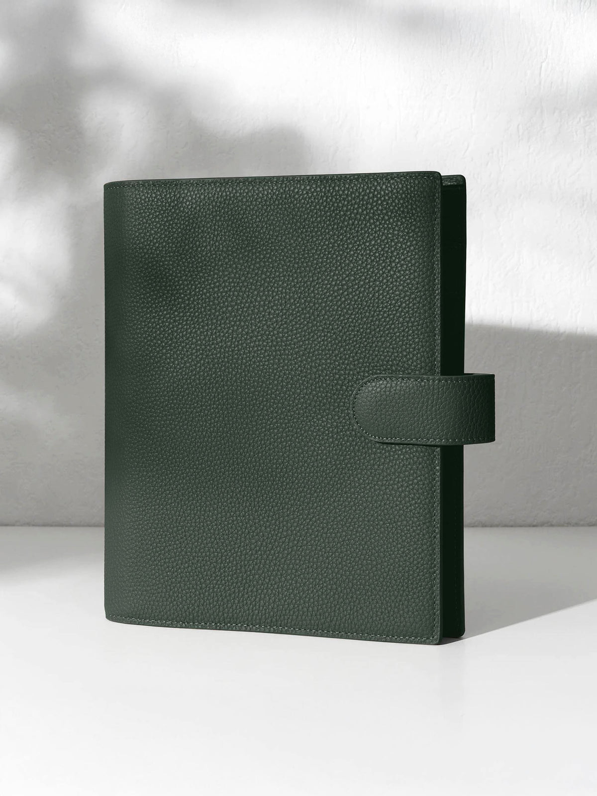 Cypress leather agenda displayed against a shadowed background.