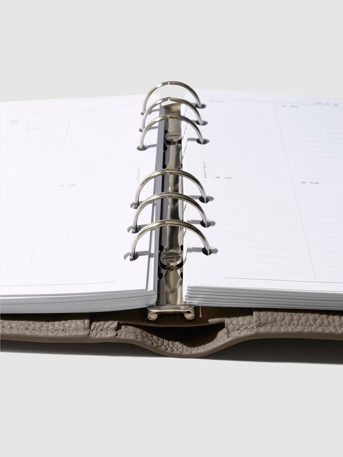Close-up of the cortado leather agenda ring mechanism.