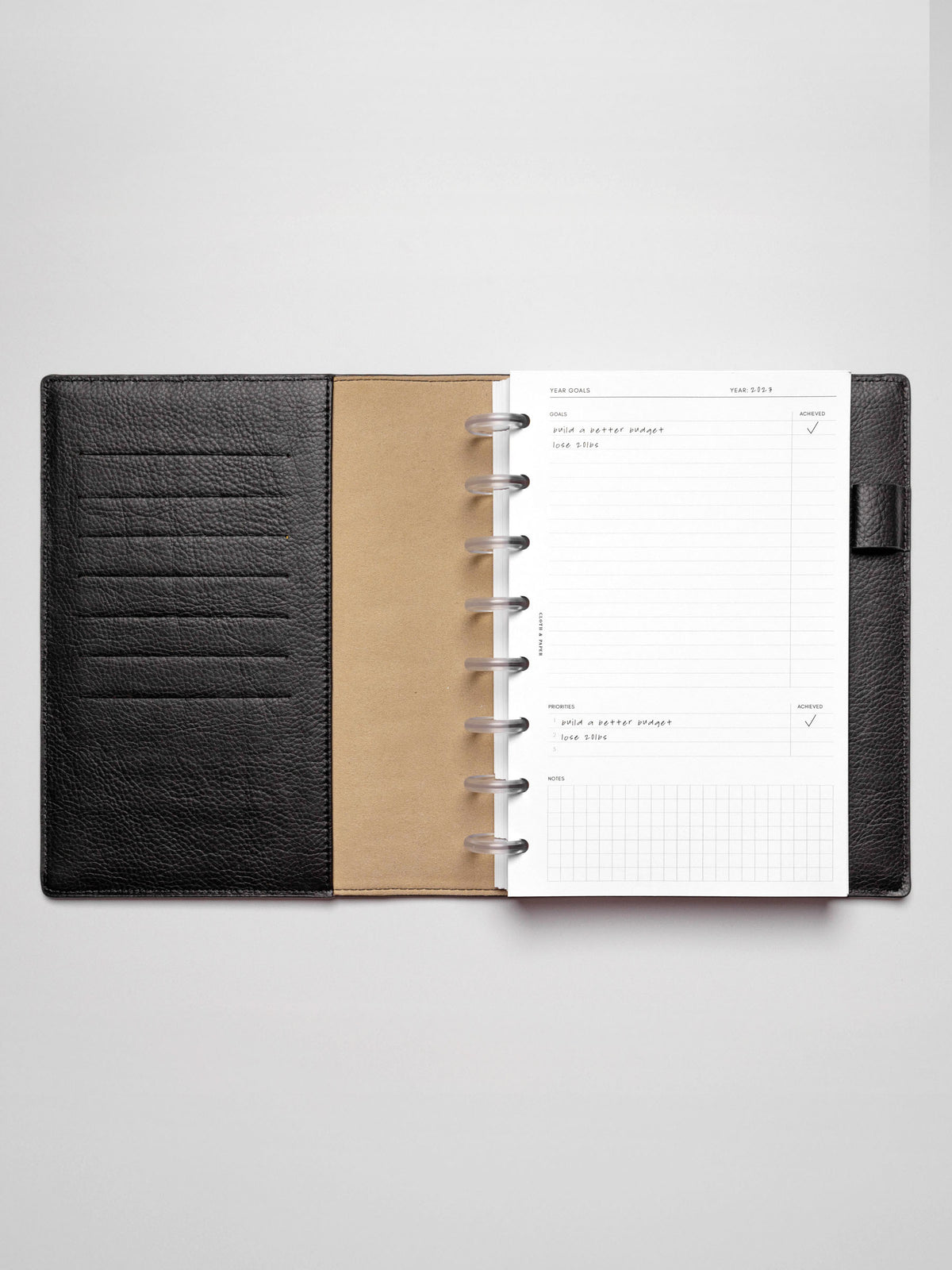 Insert in use inside a discbound planner system. Size shown is HalfLetter.