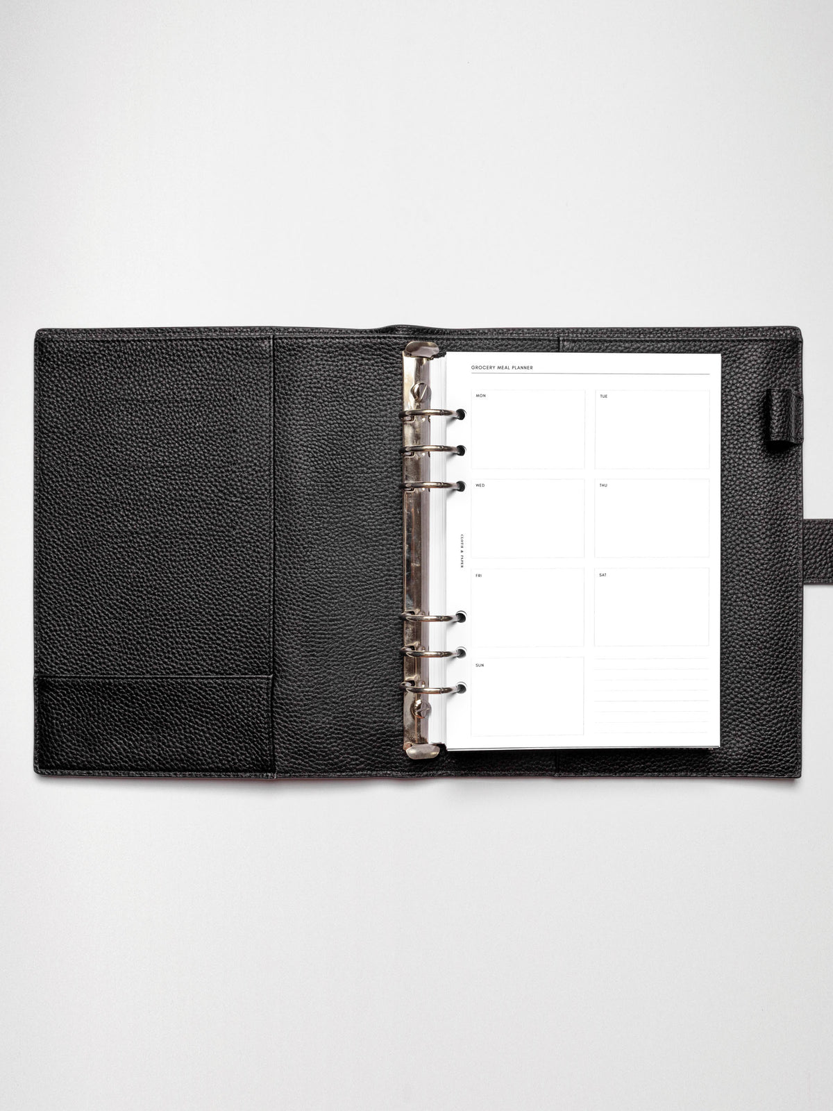 Grocery Meal Planner Insert inside an opened planner.