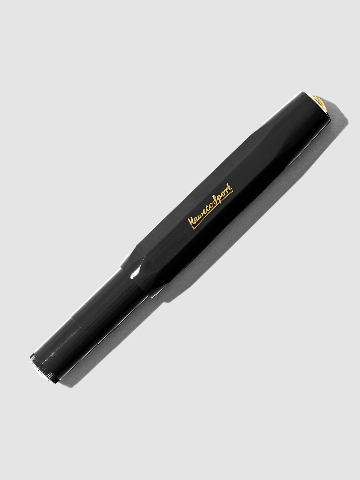 Black Extra Fine Nib pen displayed capped on a neutral background.