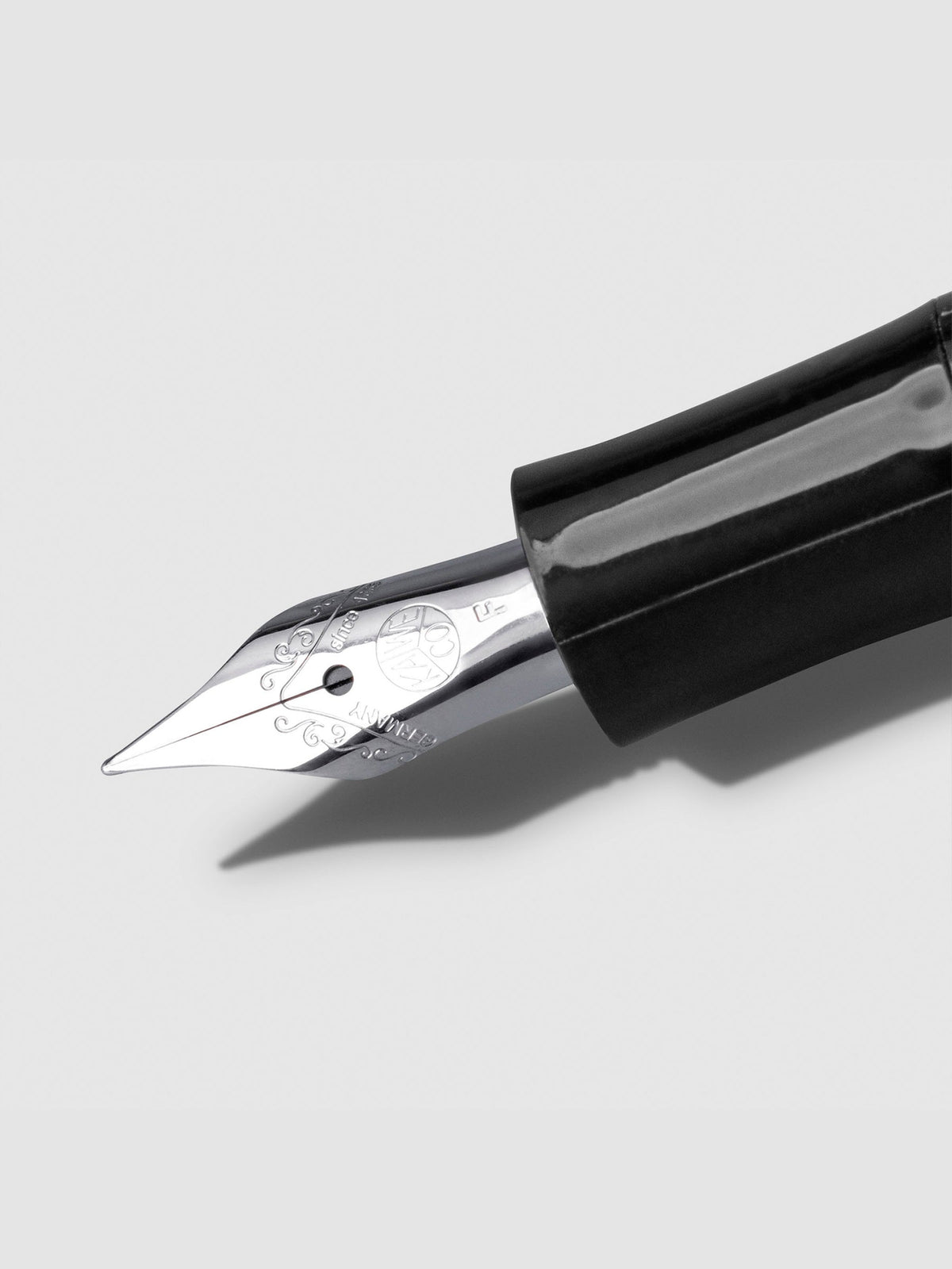 Steel nib displayed on a neutral background.