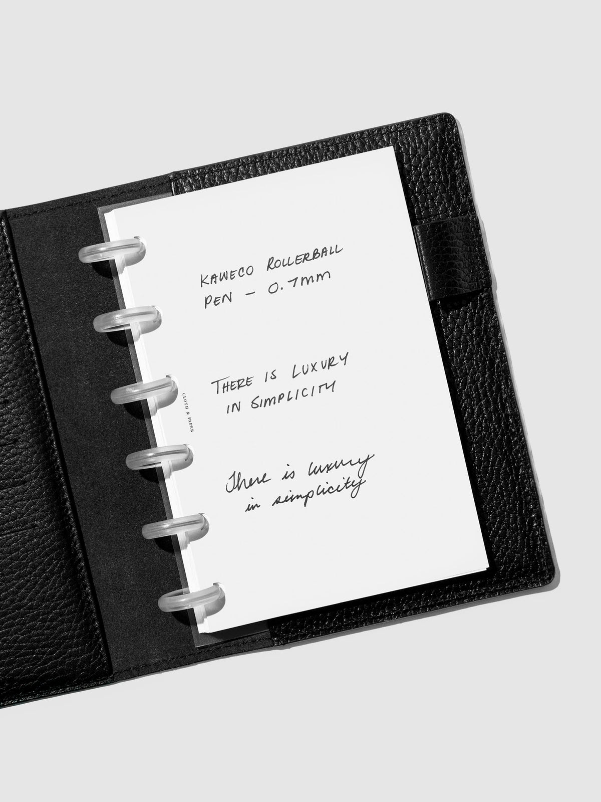 Pen test sheet showing a 0.7 mm writing sample in black.