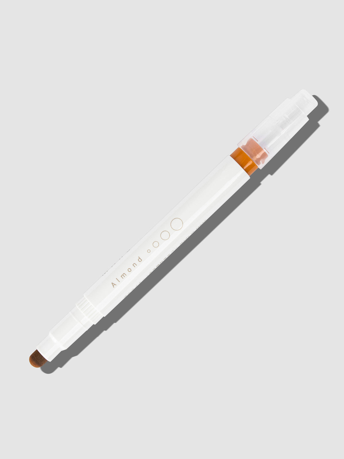 Kobaru Maru Liner, Almond, Cloth and Paper. Almond highlighter with tip exposed and cap posted to the end of its barrel on a neutral background.