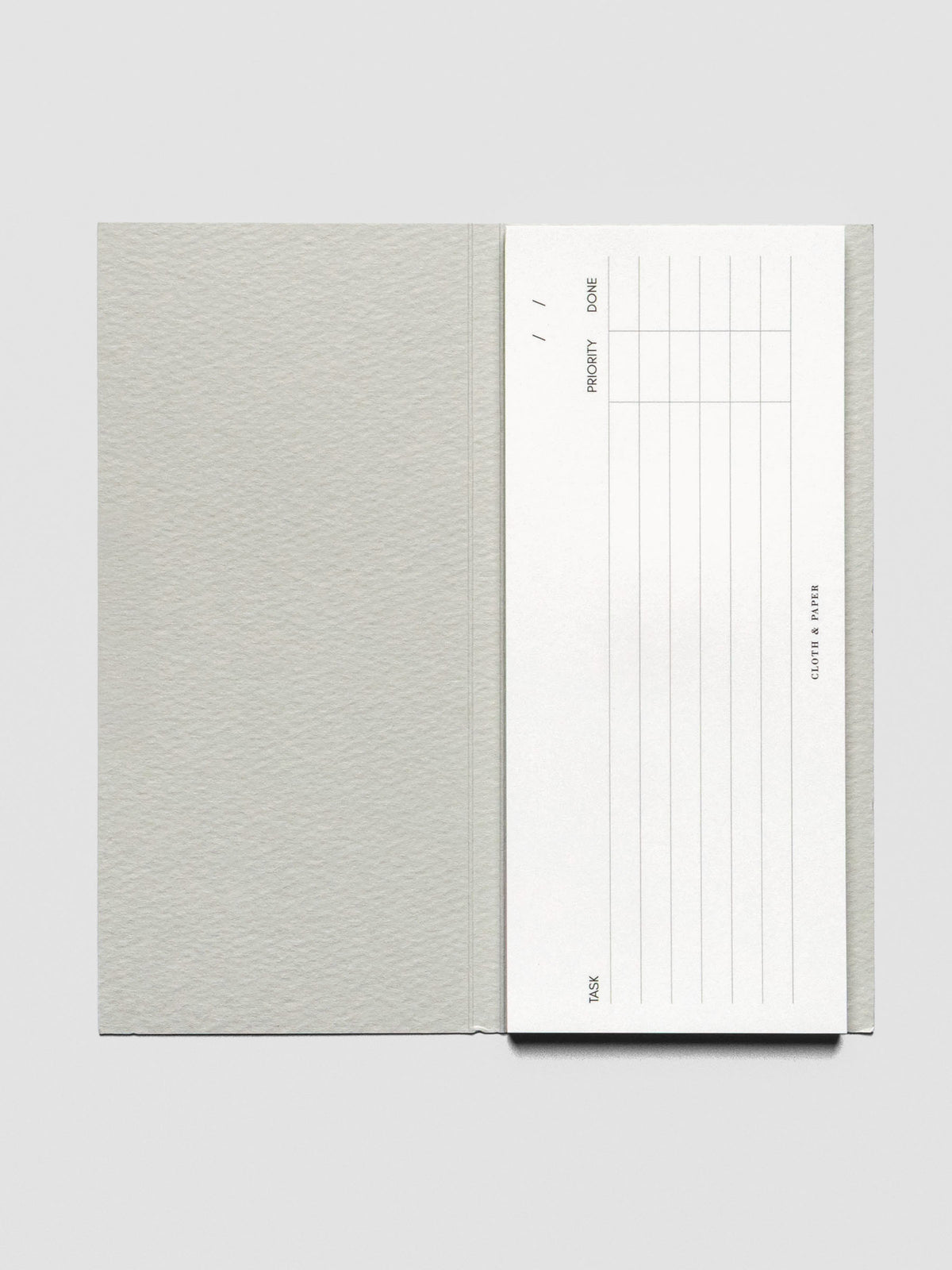 Open top-down view of the Long Ivy Lee Sidebar Sticky Note showing lined white paper with six task rows, priority and done columns, and a blank space for the date at the top.