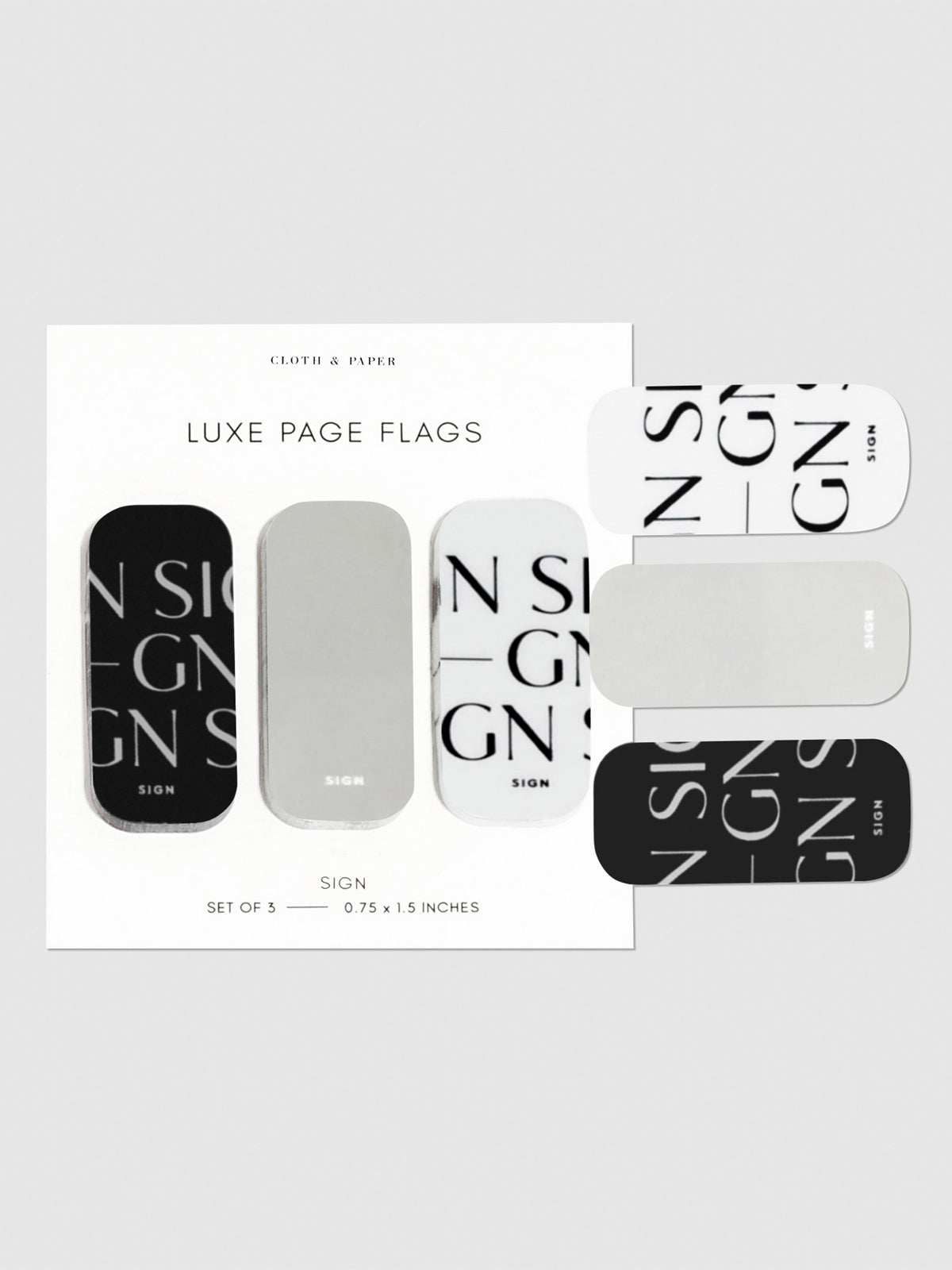 Sign page flags on their backings on a neutral background. One of each flag is stuck to the right side of the backing.