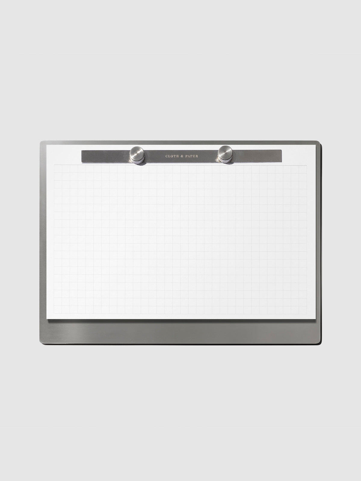 Modern Bound Notepad Insert Refills, graph, filled on the Modern Bound Notepad board, resting on a light gray background