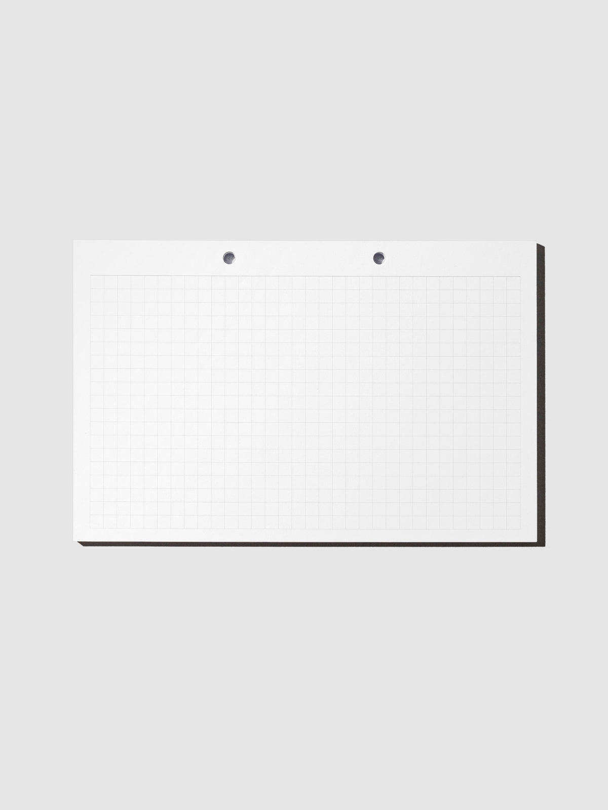 Modern Bound Notepad Insert Refills, graph, resting on a light gray background