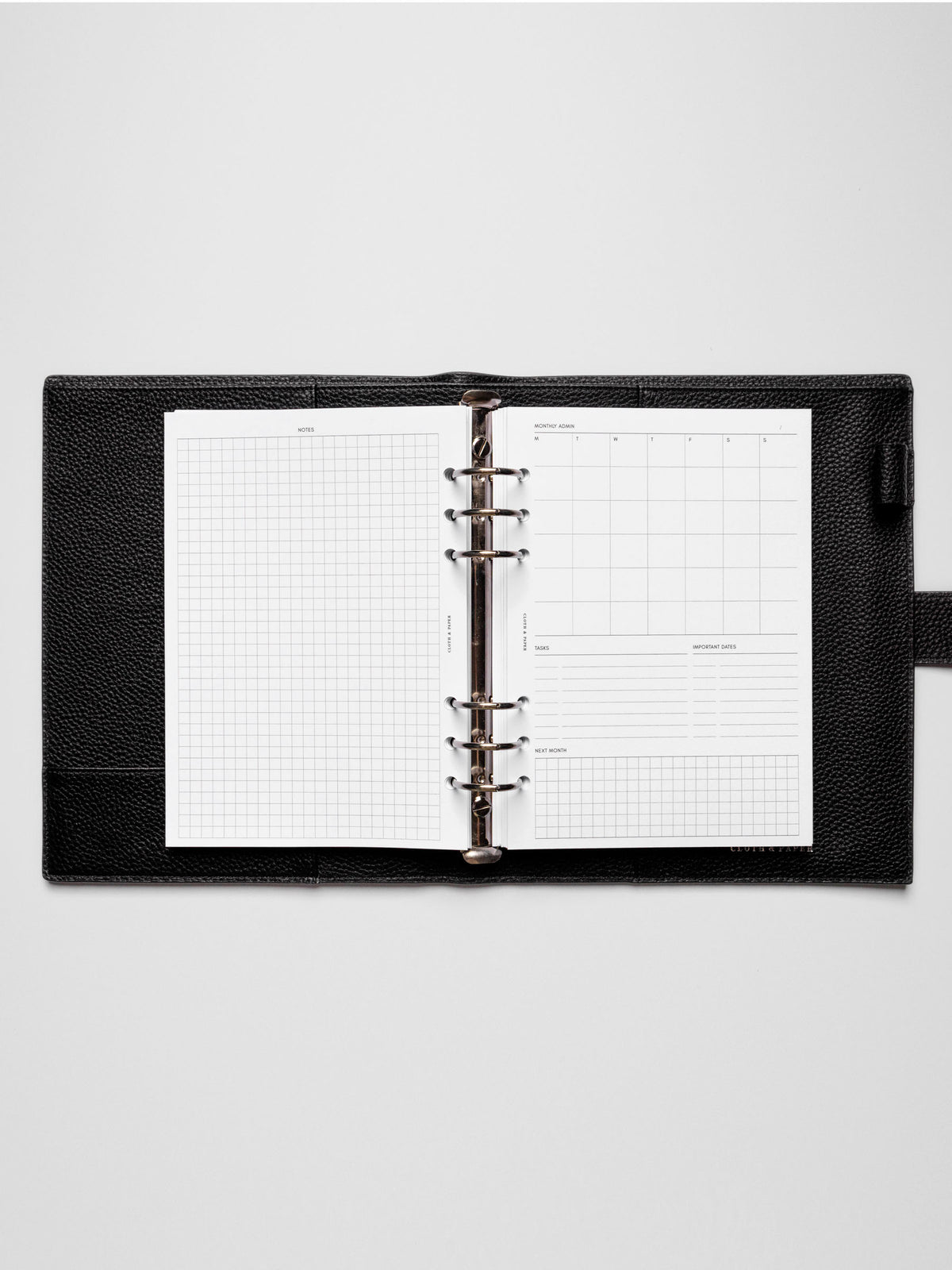 Insert in use inside a black leather planner.