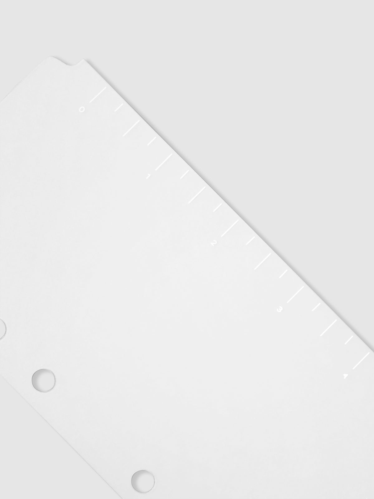 Closeup of page marker on a neutral background.