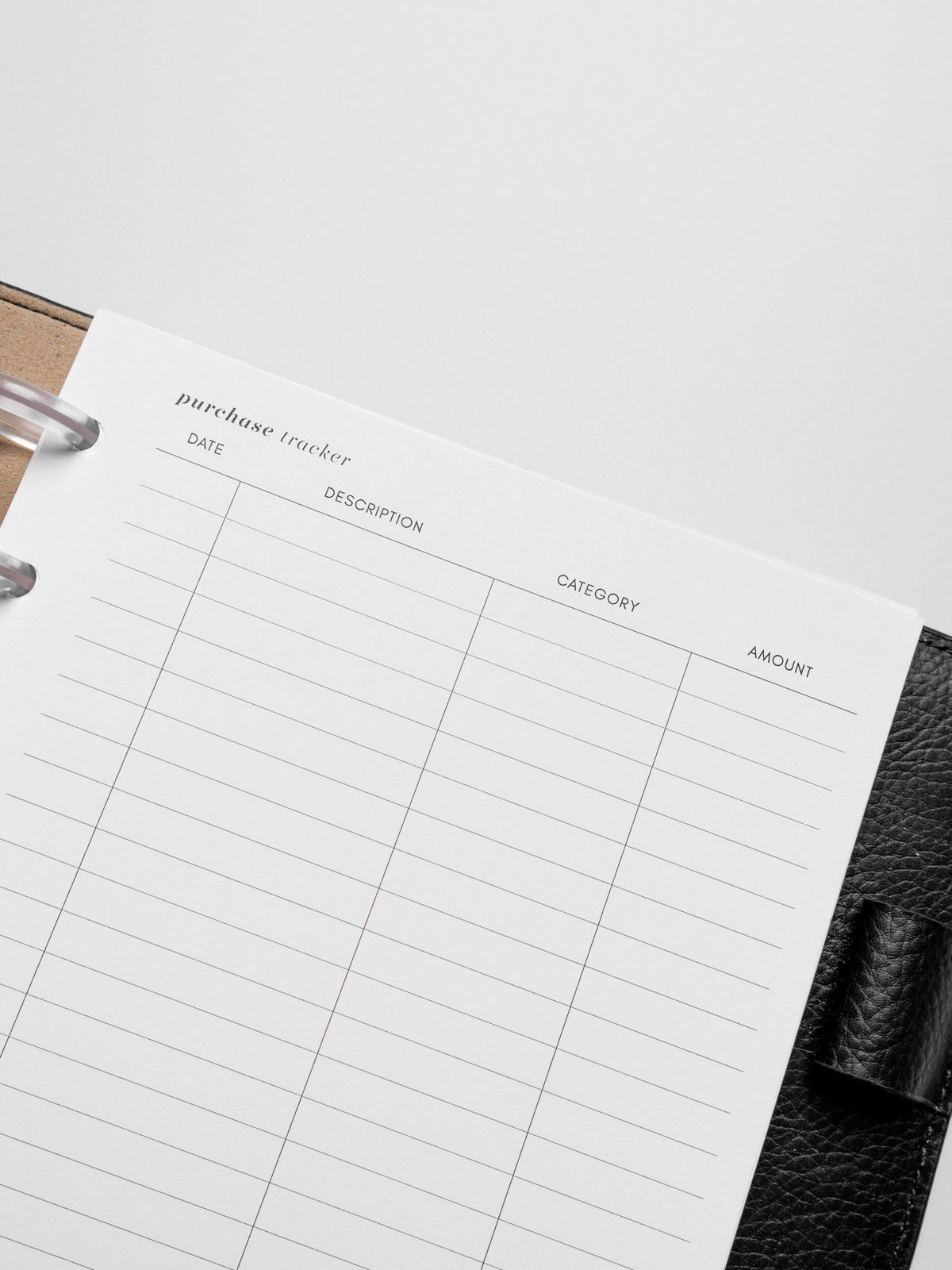 Insert in use inside a black leather planner.