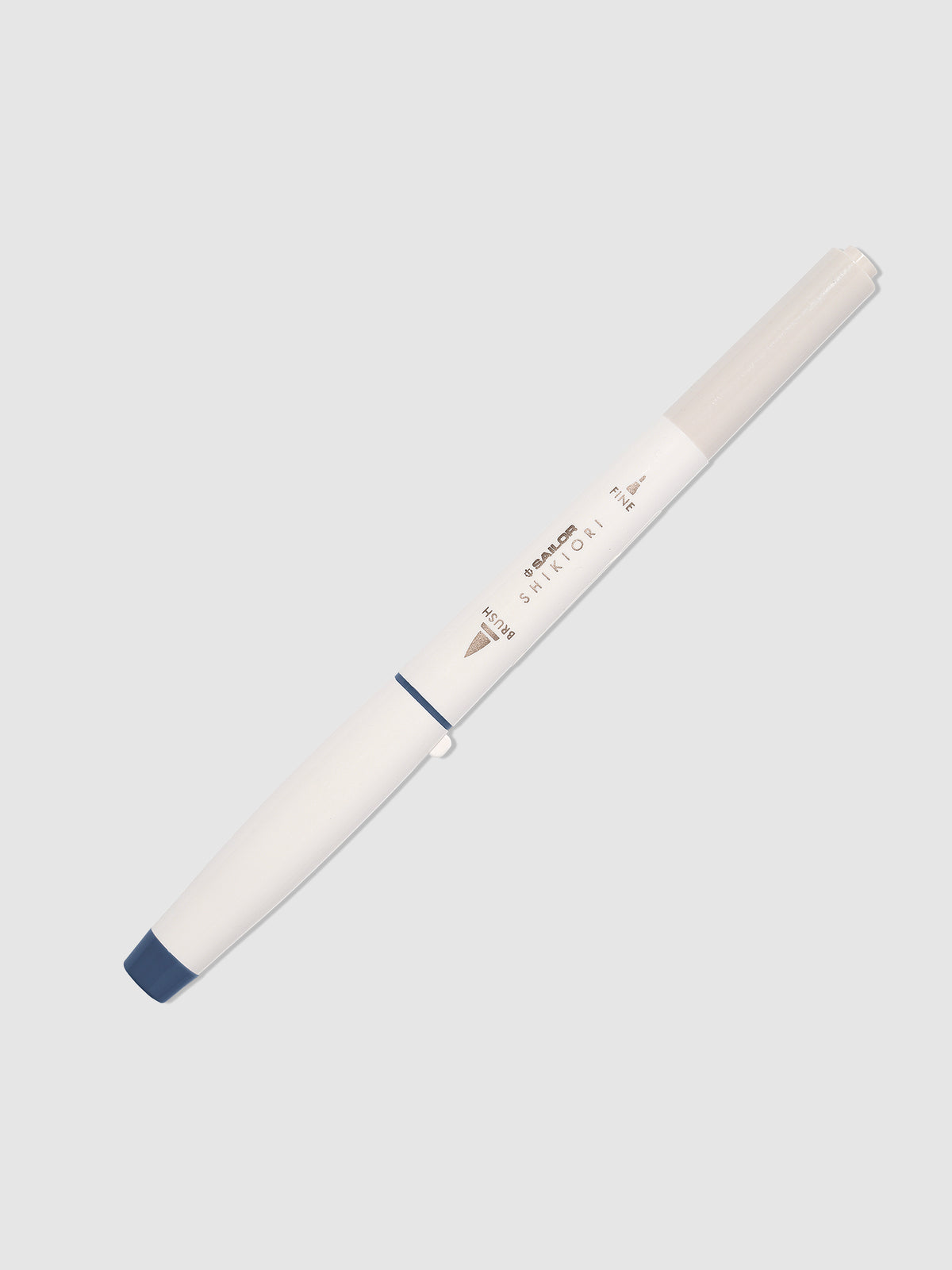 Brush pen displayed on a neutral background. Color pictured is Shimoyo.  