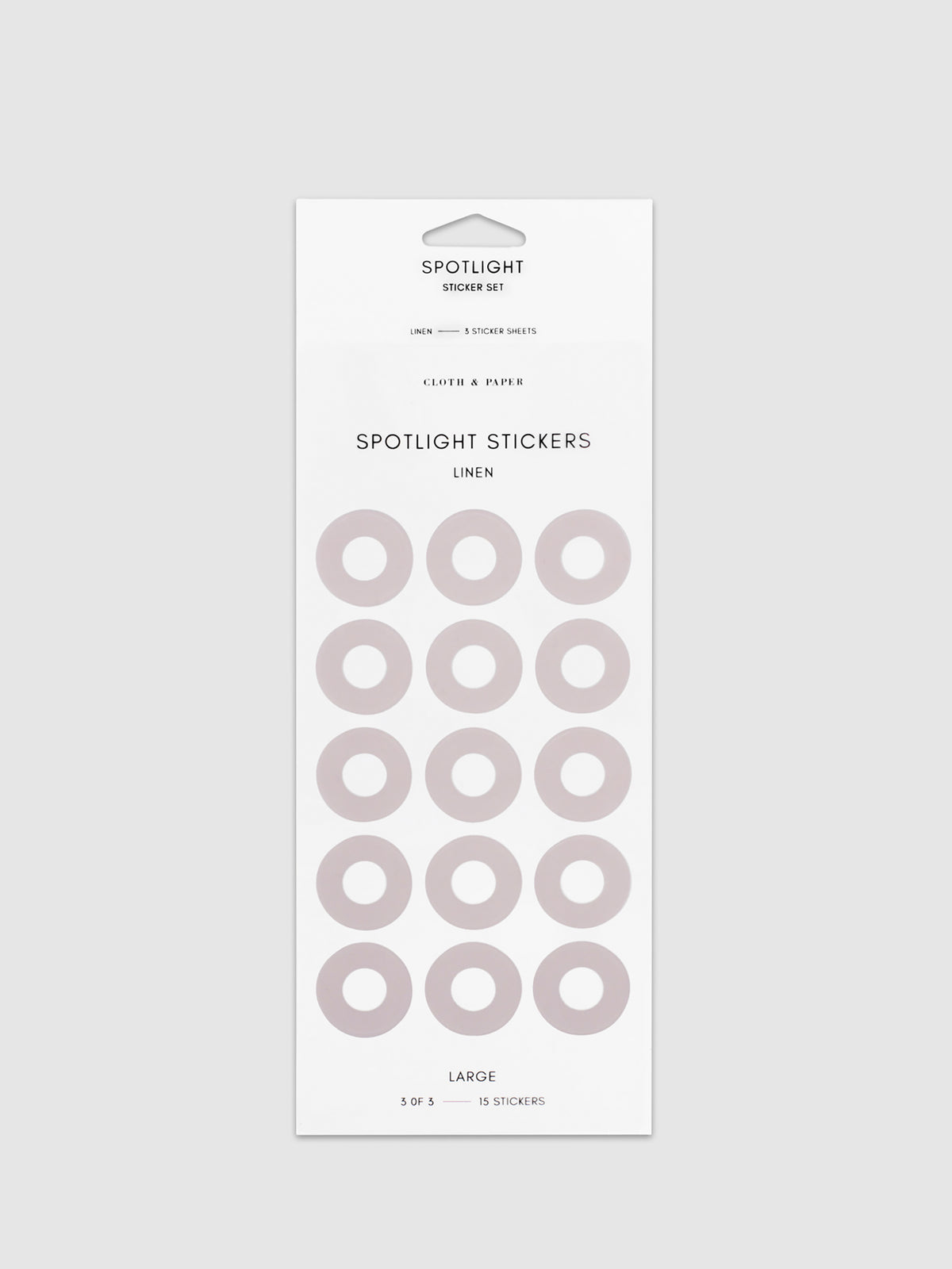 Large sticker in its packaging displayed on a neutral background. Pictured color is linen.