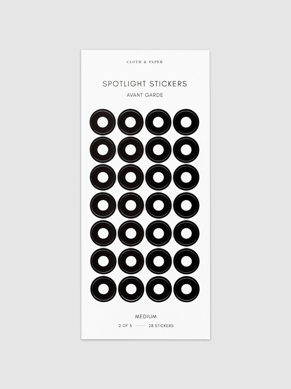 Medium sticker in its packaging displayed on a neutral background. Pictured color is avant garde.