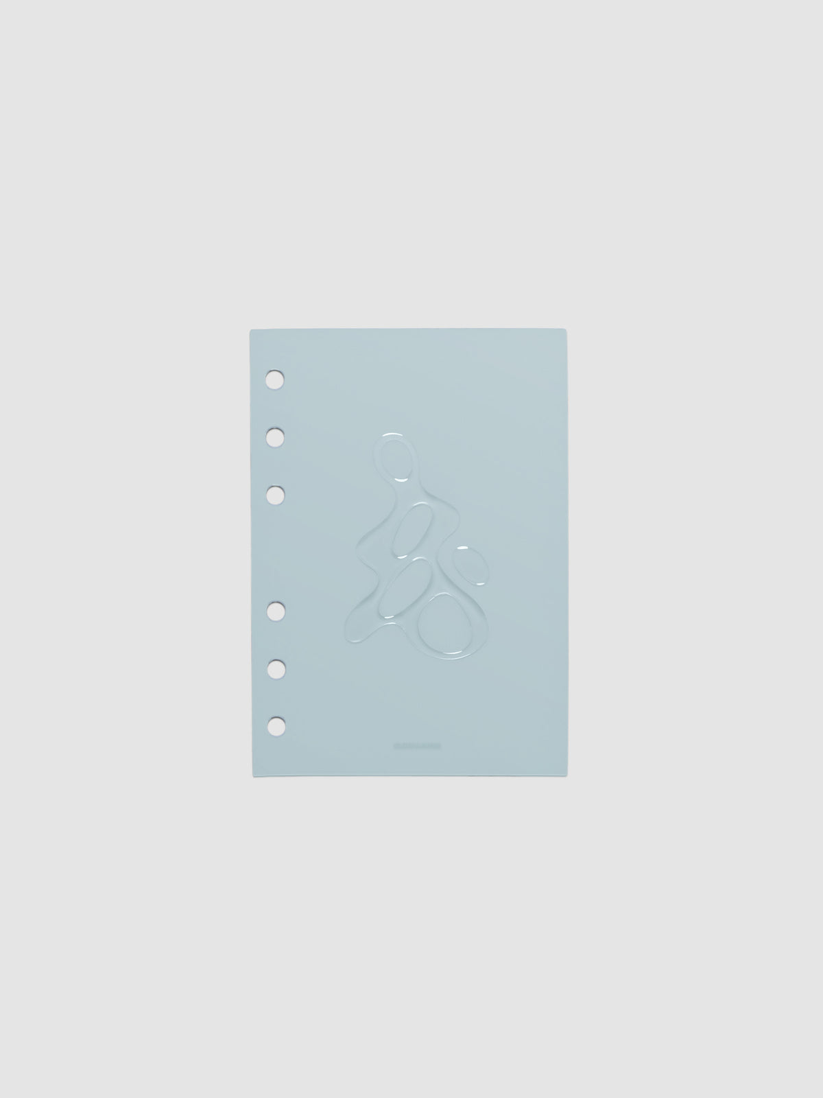 Light blue, semi-transparent, and glossy plastic planner dashboard with organic raised shape design in size A6 on a neutral background.