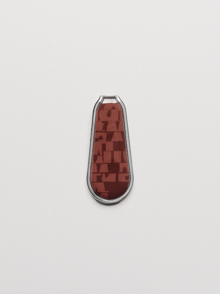 Magnetic Bookmarks | Trio in pattern torn magazine shown in the color red.