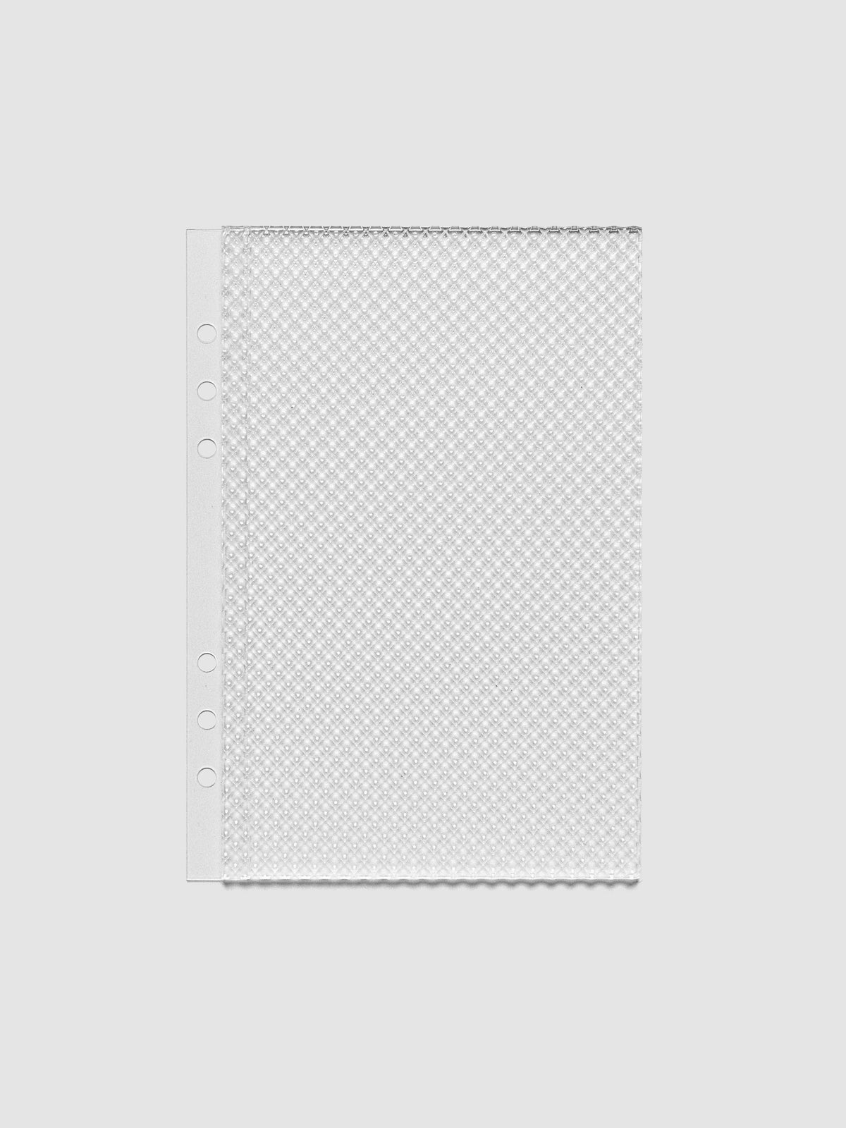 Clear, textured Studded Planner Dashboard in the size A5, on a neutral background.