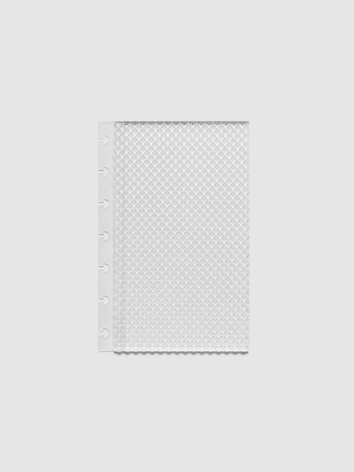 Clear, textured Studded Planner Dashboard in the size HP Mini, on a neutral background.