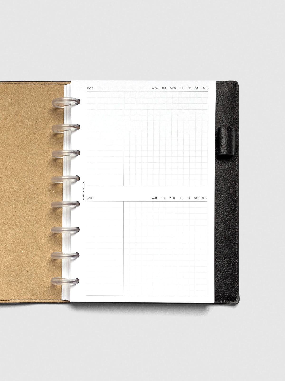 Insert in use inside a black leather planner.