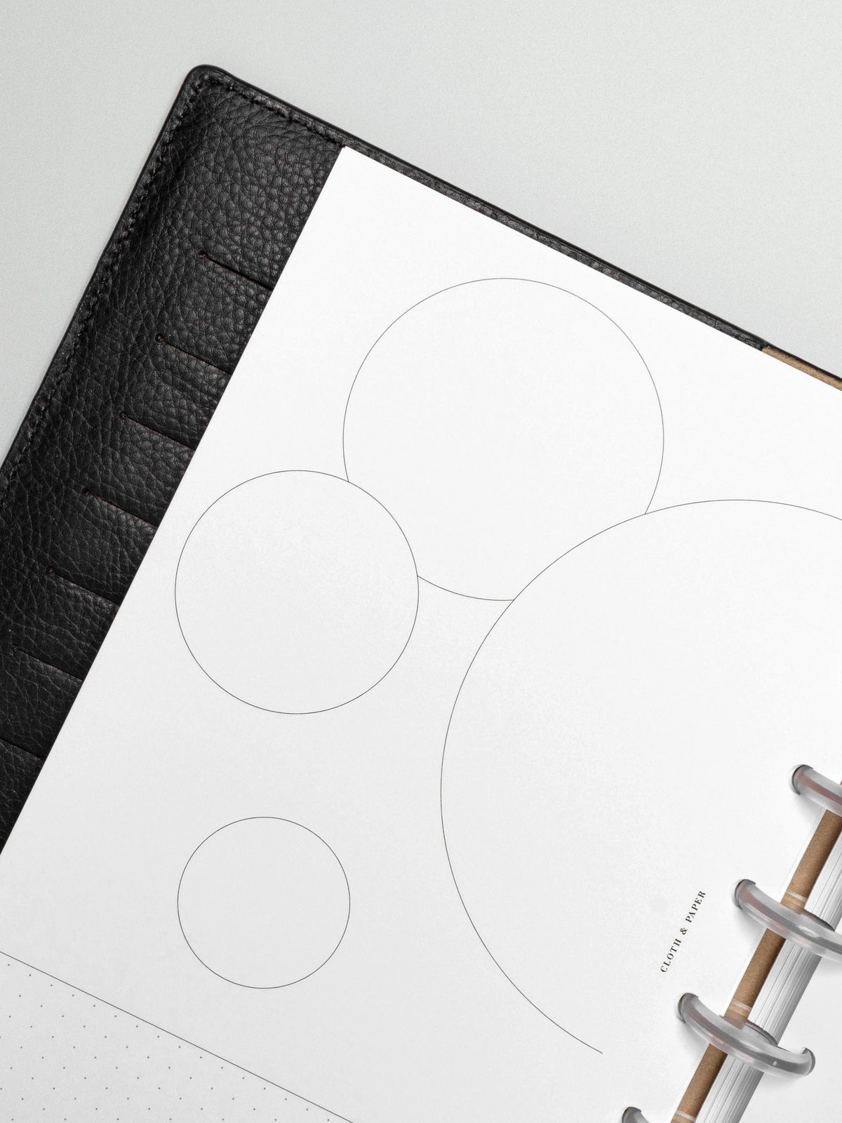 Insert in use inside a black leather planner.