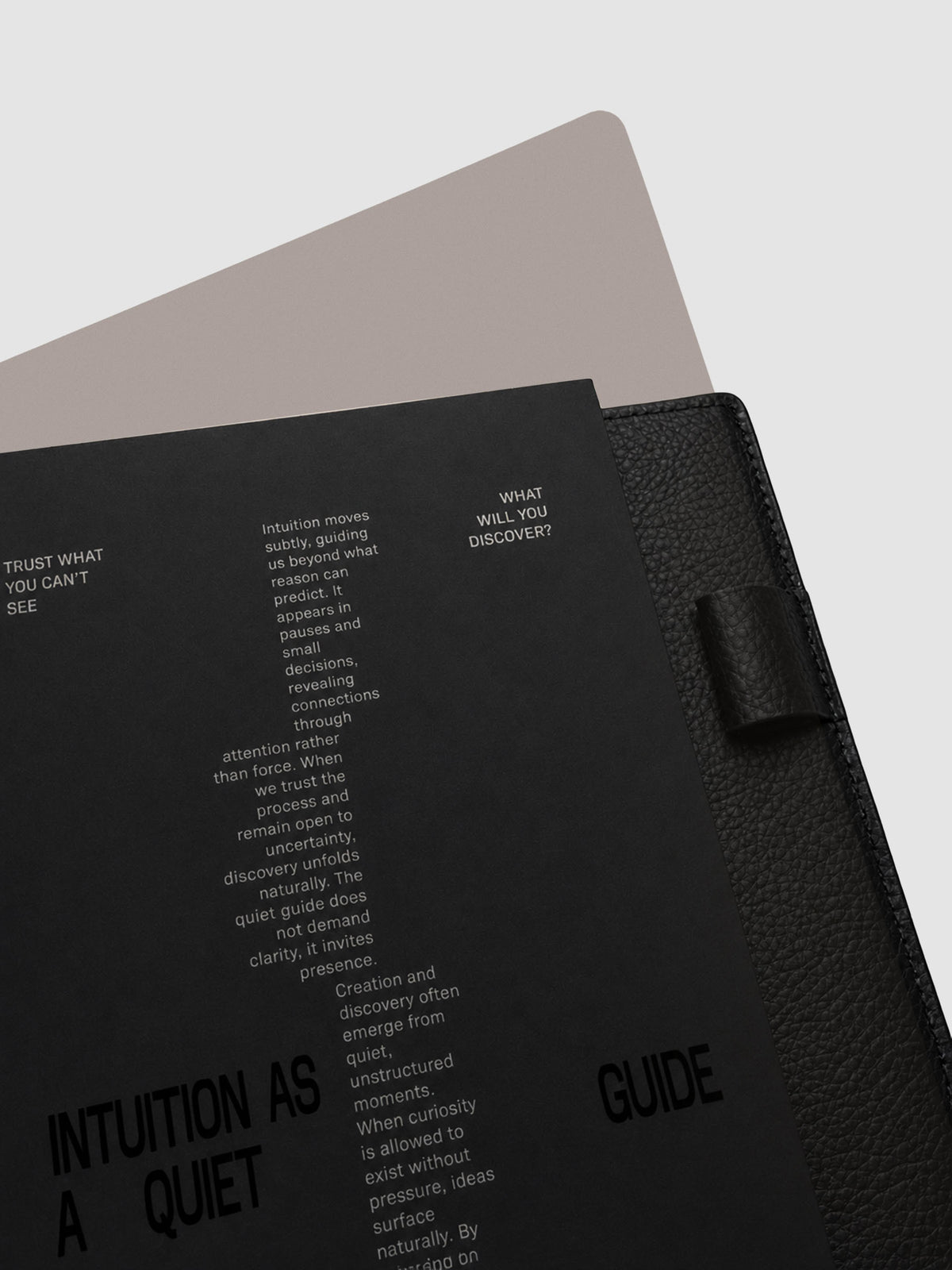 Detail view of the black Intuition Ultra Thin Planner Cover + Dashboard Set.