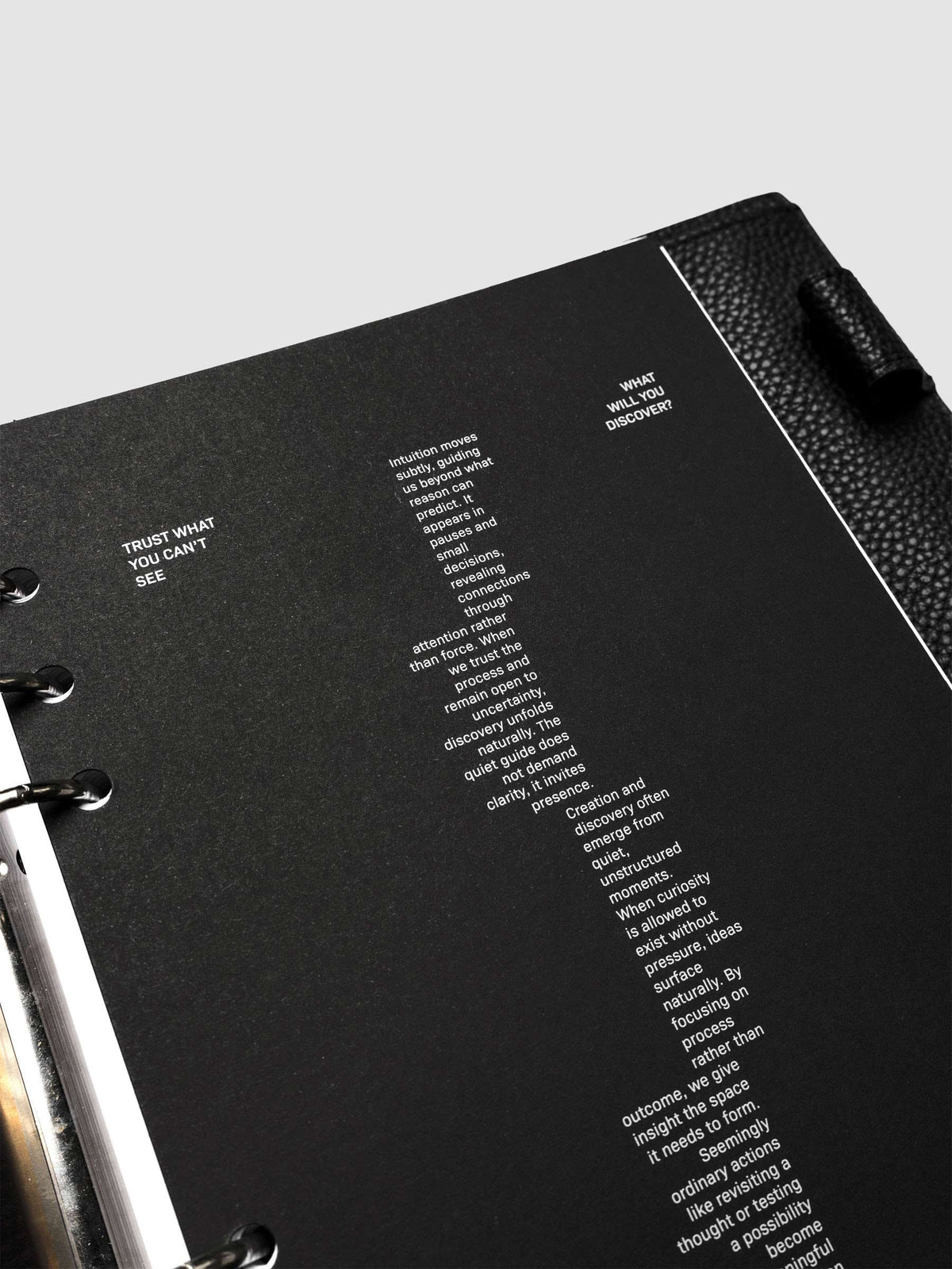 Detail view of the black Intuition Ultra Thin Planner Cover + Dashboard Set.