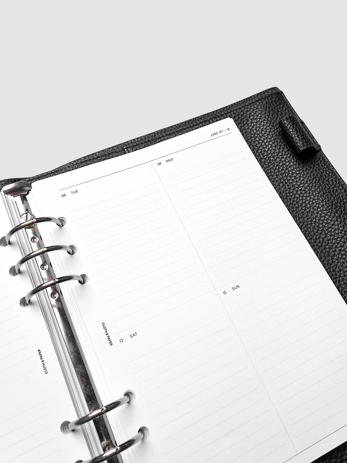 2027 Dated Weekly Vertical Planner Inserts, Monday Start, A5 6-Ring Punch, close-up of the top of the right page showing the upper daily grid sections with lined areas for notes and appointments