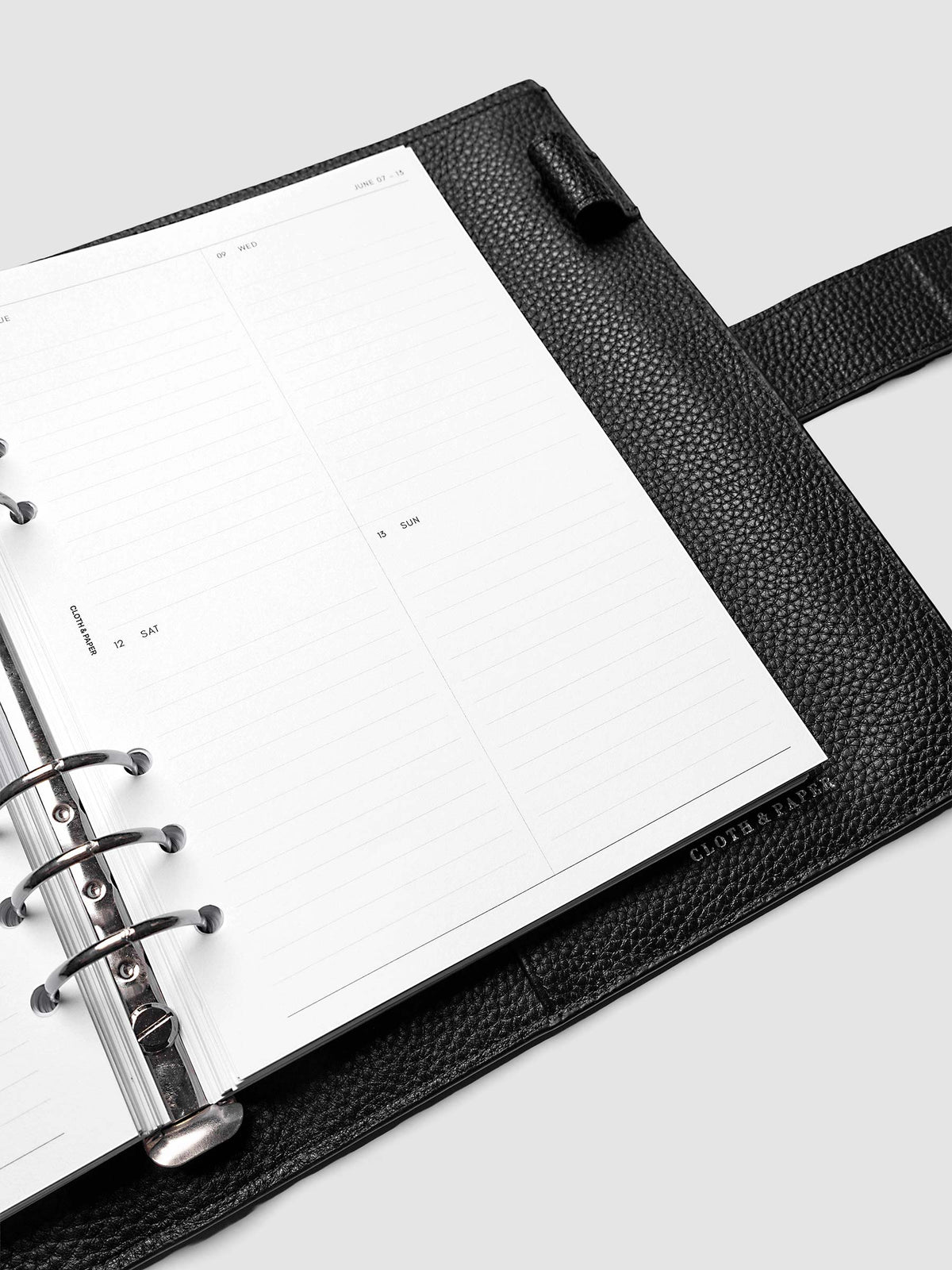 2027 Dated Weekly Vertical Planner Inserts, Monday Start, A5 6-Ring Punch, close-up of the bottom of the right page showing the lower daily grid sections with lined areas for notes and appointments